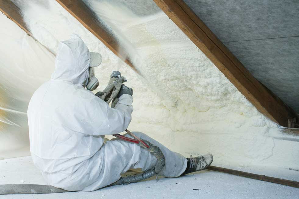 Man Spraying Insulation